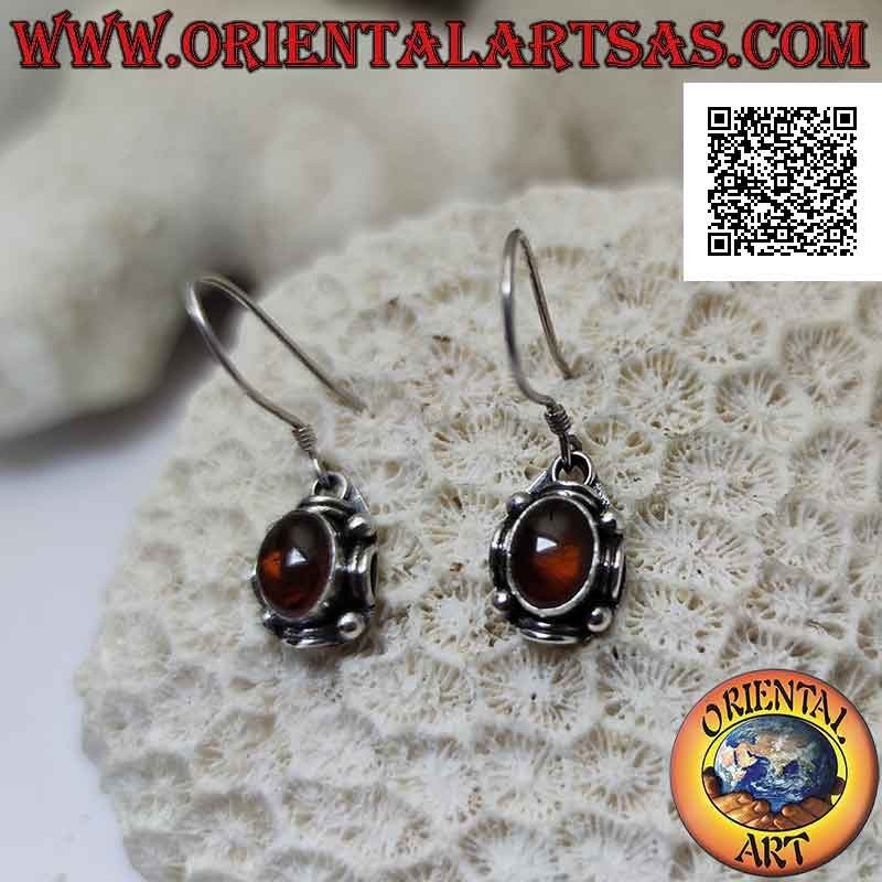 Boucles d'oreilles pendantes en argent avec ambre ovale entouré de boules et de disques alternés
