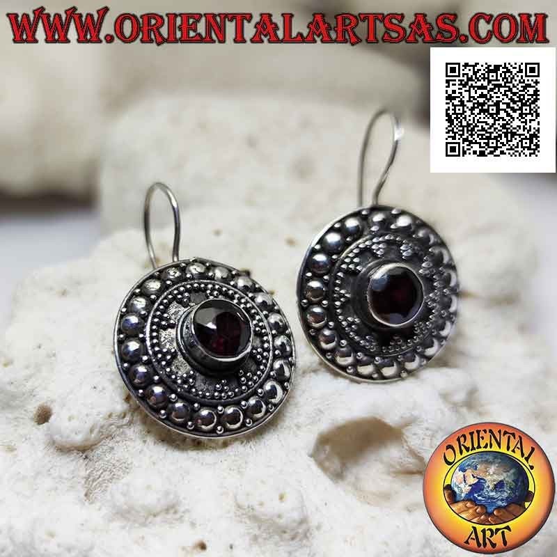 Silver shield earrings with faceted round garnet and ethnic decoration of balls and studs