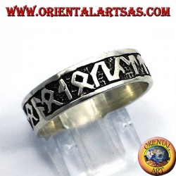 silver ring with Celtic runes