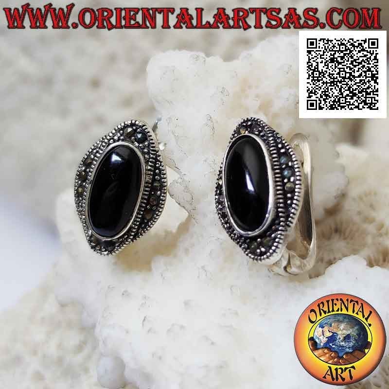 Silver earrings with oval onyx surrounded by a double intertwined ellipse studded with marcasite