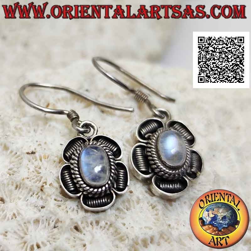Silver flower earrings with cabochon oval rainbow moonstone and bas-relief decoration