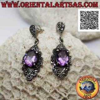 Silver earrings with faceted natural amethyst set protruding on a frame studded with marcasite
