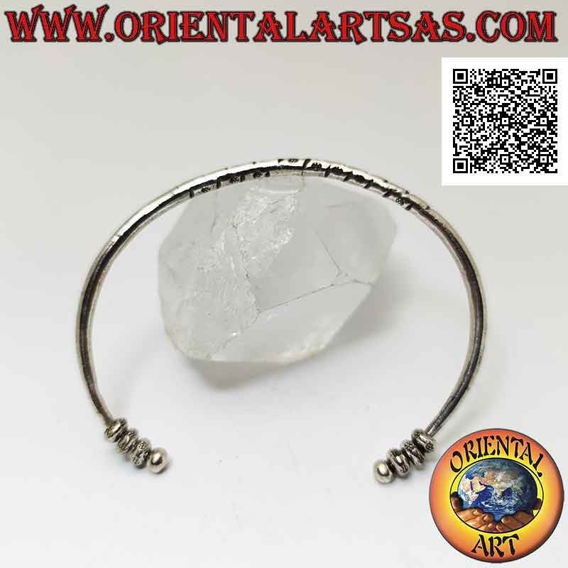 Round rigid bracelet in 925 ‰ silver with central engravings and trio of mobile donuts on the terminals