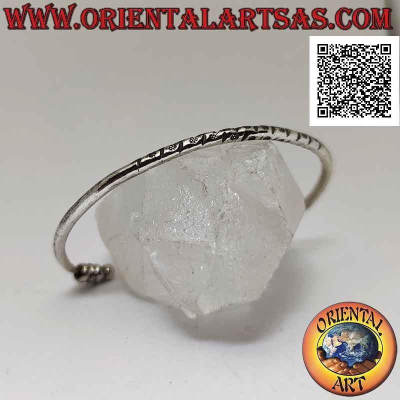 Pulsera rígida redonda en plata 925 ‰ con grabados centrales y trío de donas móviles en los terminales