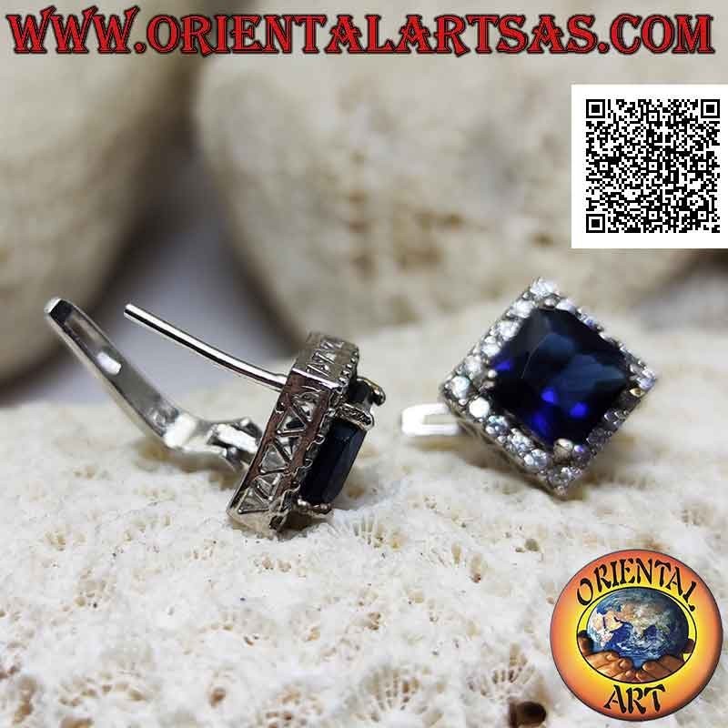 Silver earrings with square synthetic sapphire set surrounded by zircons and fretwork on the sides