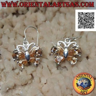 Silver pendant earrings in the shape of a butterfly with lemon yellow zircon set in the wings