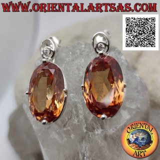 Pendientes de plata con lóbulos con grandes circonitas de champán ovaladas facetadas engastadas en un engaste suave