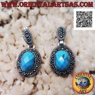 Pendientes de plata con pasta de turquesa ovalada facetada y saliente rodeada de marcasita