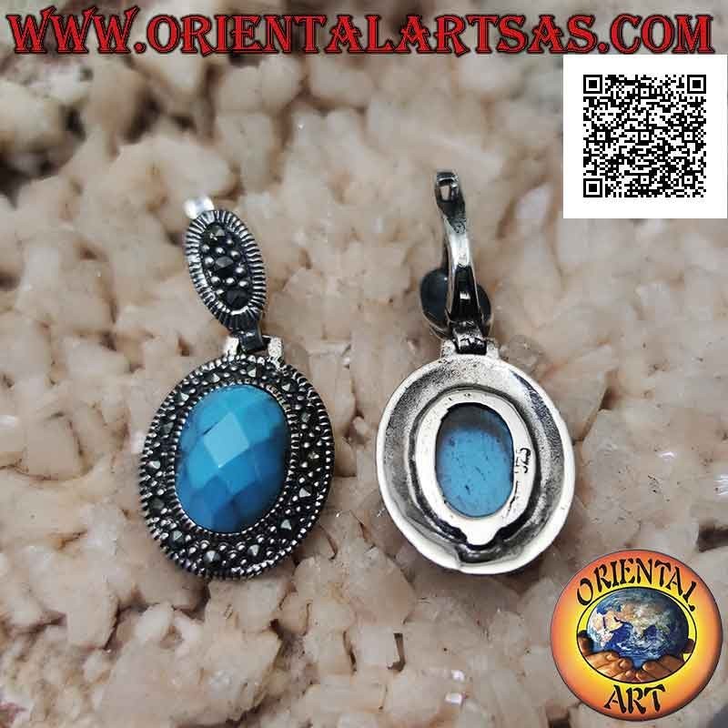 Boucles d'oreilles en argent avec pâte turquoise ovale facettée et saillante entourée de marcassite
