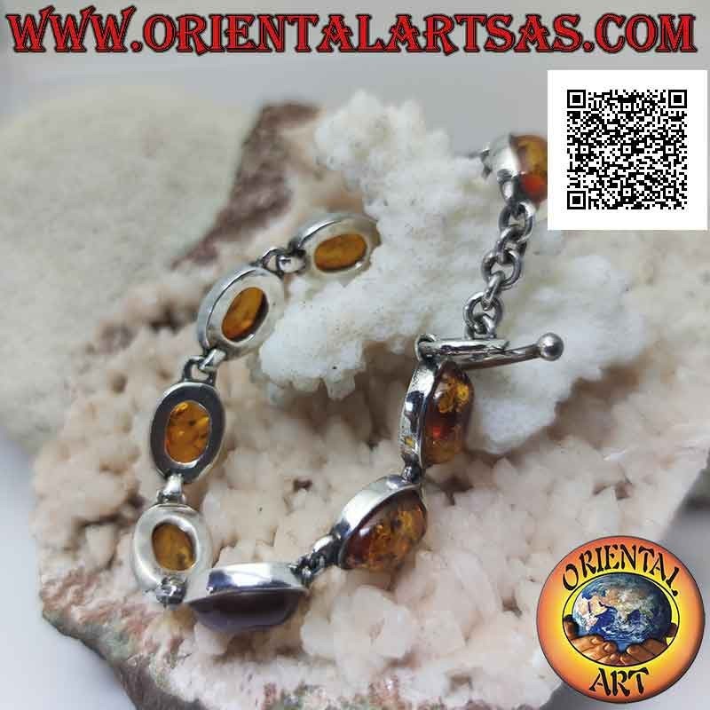 Bracciale in argento 925‰ con nove ambra ovale cabochon a filo bordo liscio