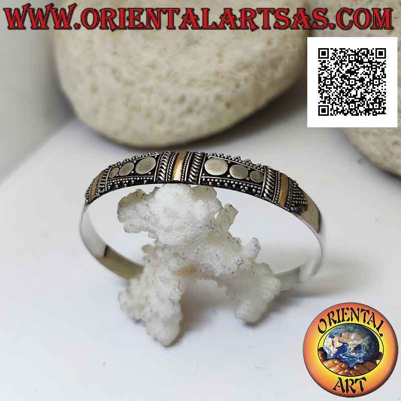 Rigid bracelet in 925 ‰ silver with 3 14-karat gold plates and stud decoration
