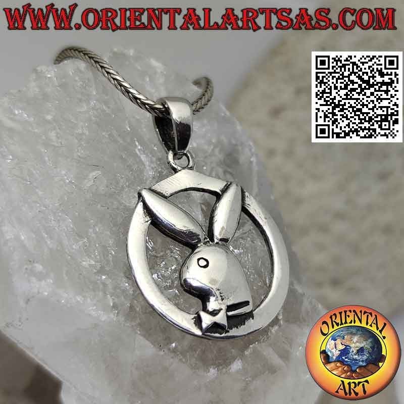 Silver pendant in the shape of a "playboy" bunny in the circle