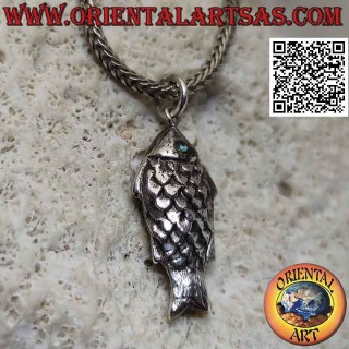 Three-dimensional fish-shaped silver pendant with turquoise eyes
