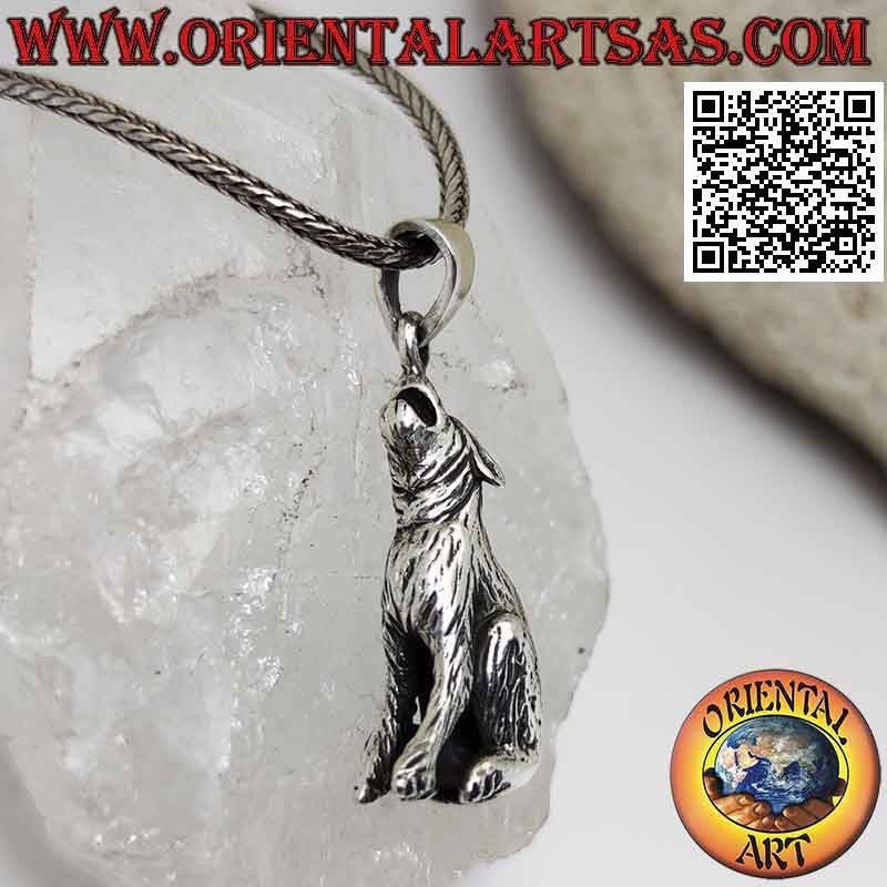 Silver pendant in the shape of a three-dimensional howling wolf