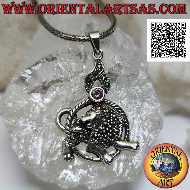 Silver pendant in the shape of a lion in the circle with mane and mantle studded with marcasite and pink zircon above