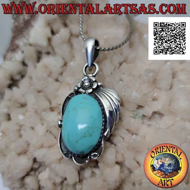 Silver pendant with large oval cabochon turquoise paste and flower with leaf on top