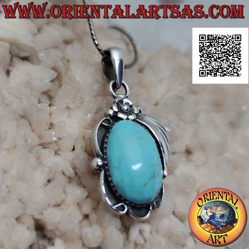 Ciondolo in argento con grande pasta di turchese ovale cabochon e fiore con foglia sopra