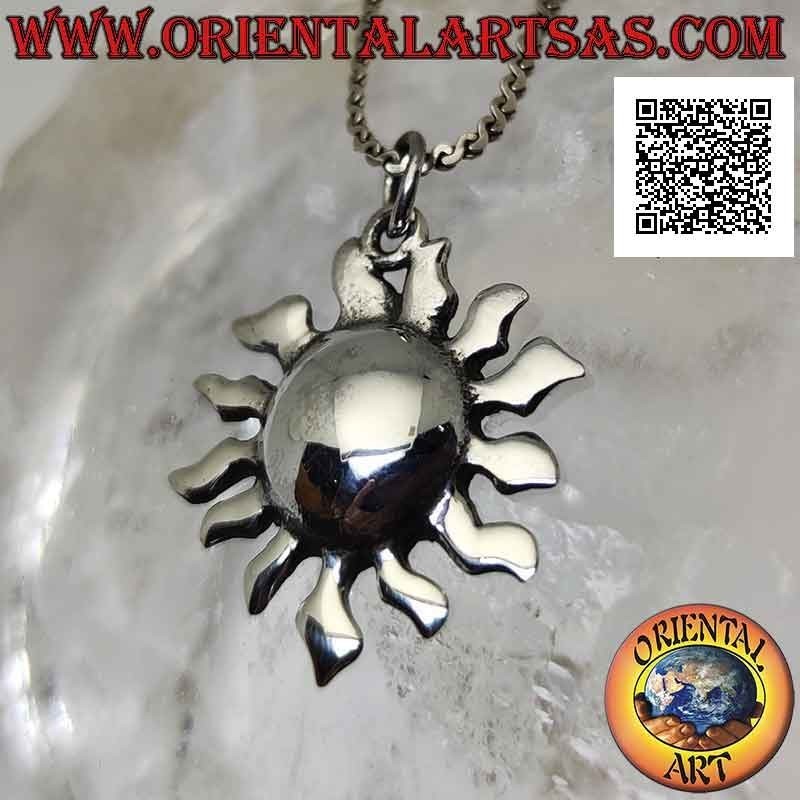 Smooth silver pendant in the shape of a sun with a rounded center and curved rays