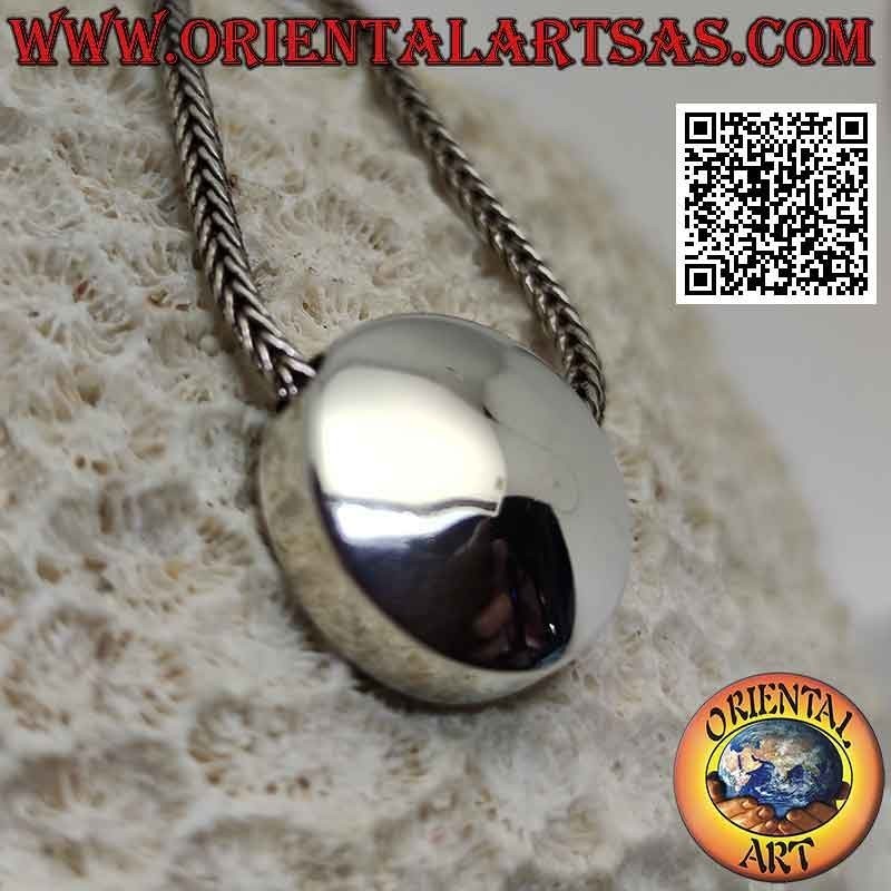 Smooth silver pendant in the shape of a convex button with holes on the sides