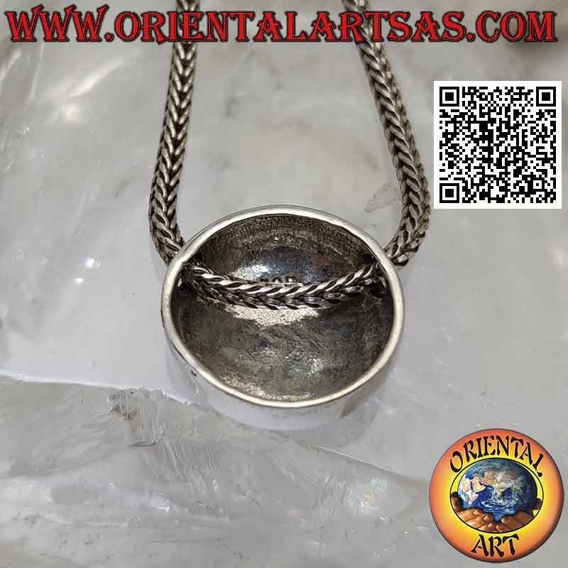 Smooth silver pendant in the shape of a convex button with holes on the sides