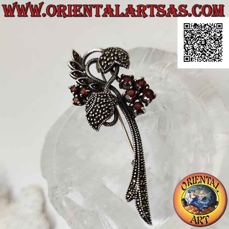 925 ‰ silver brooch in the shape of a floral plant studded with marcasite and round garnets set