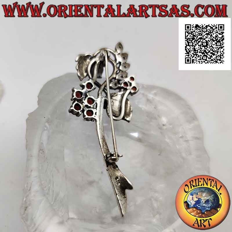 925 ‰ silver brooch in the shape of a floral plant studded with marcasite and round garnets set