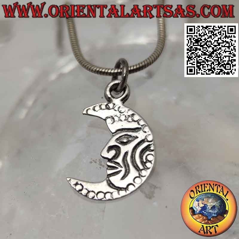 Pendentif en argent, croissant plat orné d'un visage gravé