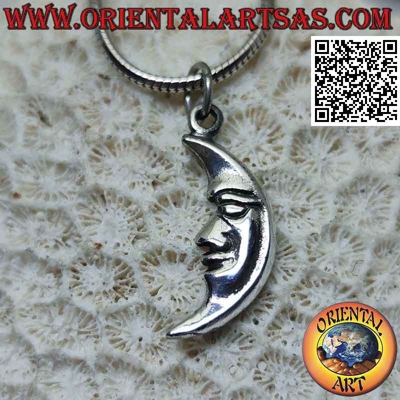 Silver pendant, crescent with shaped face