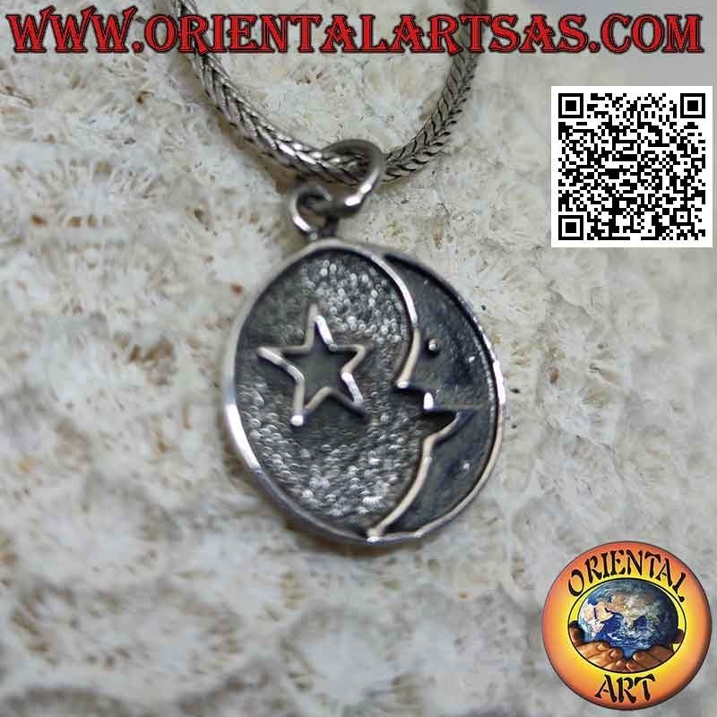 Silver pendant, medal with moon and star in bas-relief