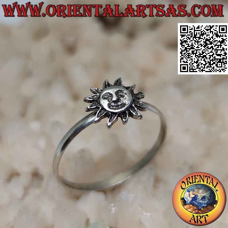 Silver ring with a small sun with a shaped face