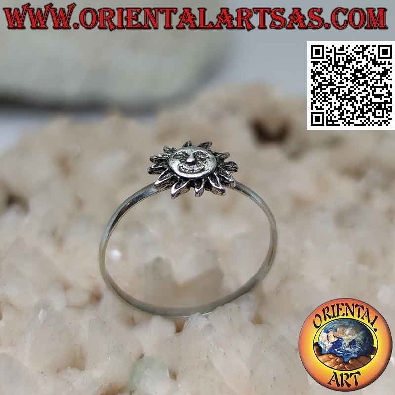 Silver ring with a small sun with a shaped face