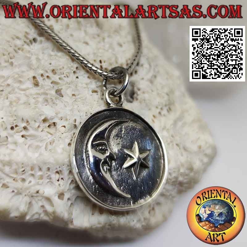 Silver pendant, medal with moon and star in relief