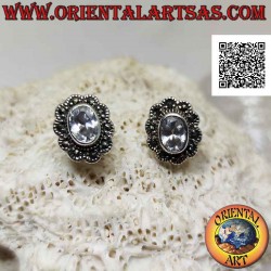 Silver lobe earrings with...