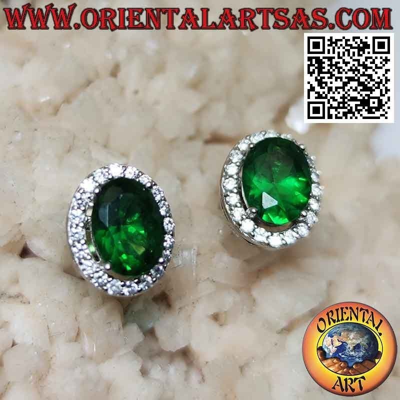 Silver earrings with oval synthetic emerald set surrounded by zircons