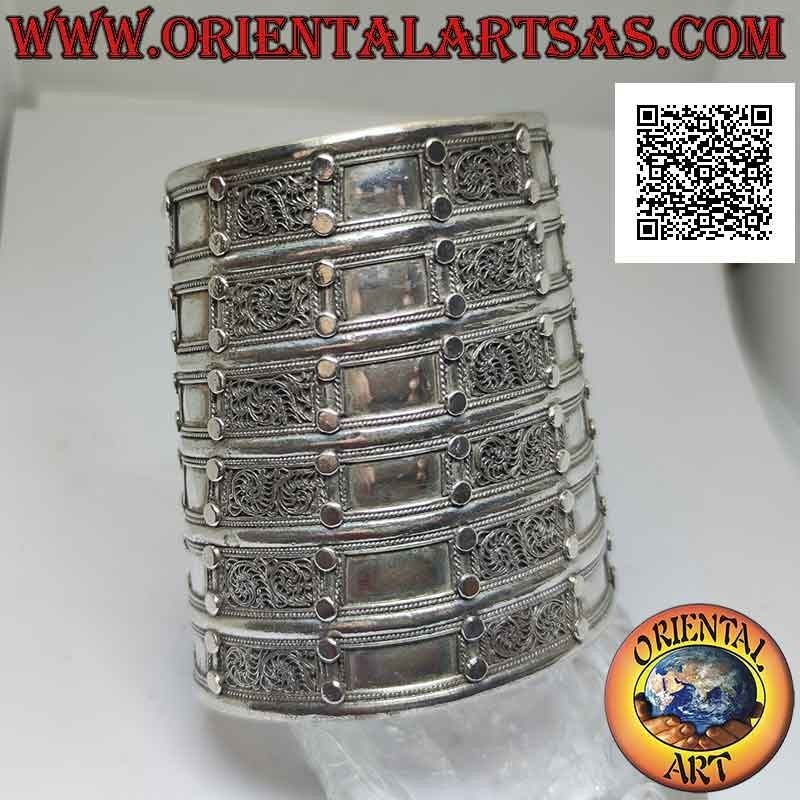 Wide rigid bracelet in 925 ‰ silver "alla schiava" with relief decorations (8.7 cm)