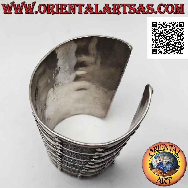 Wide rigid bracelet in 925 ‰ silver "alla schiava" with relief decorations (8.7 cm)