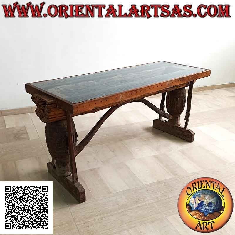 Tavolo con ripiano in vetro nel tronco in legno di teak antico riciclato da mezzi agricoli (90h x 180x65)
