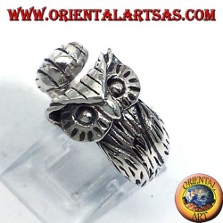 silver ring, enveloping Owl