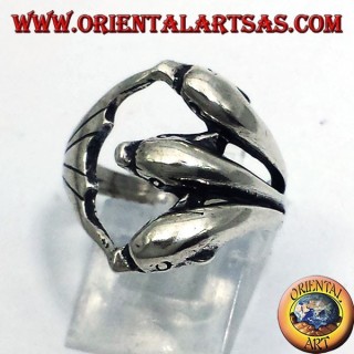 Handcrafted 925 sterling silver ring featuring three dolphins in a dynamic circular wrap design.
