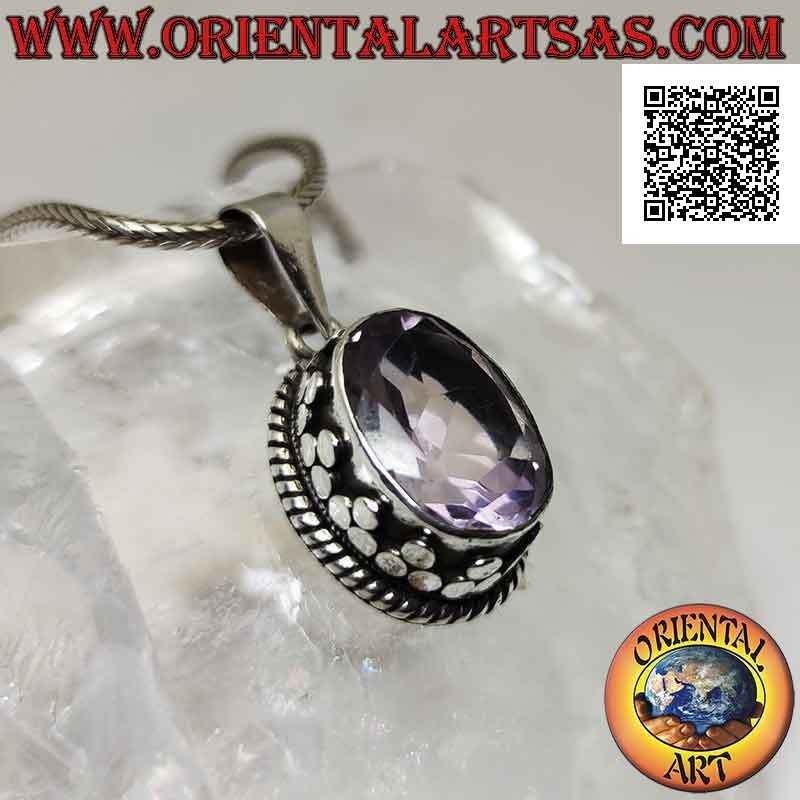 Silver pendant with splendid natural oval faceted amethyst surrounded by studs and intertwining