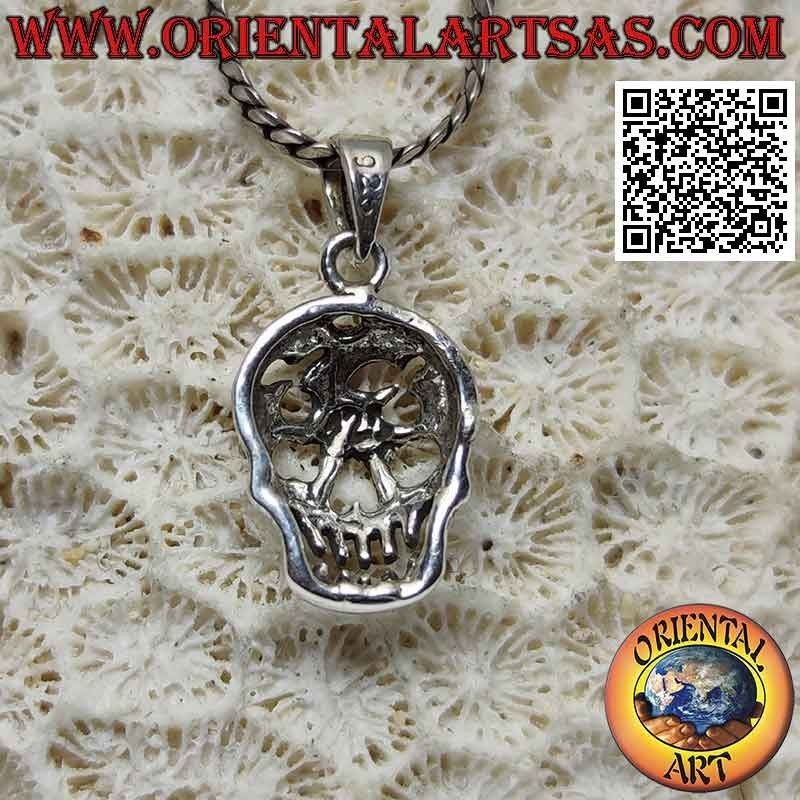 Silver pendant, the smiling skull with perforated forehead