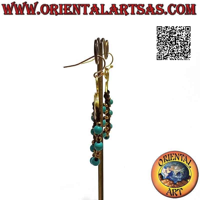 Boucles d'oreilles artisanales en laiton doré et technique macramé avec perles turquoises (ovales)