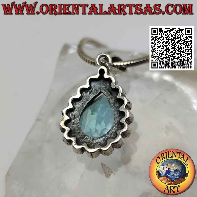 Silver pendant with drop-shaped blue topaz set surrounded by marcasite