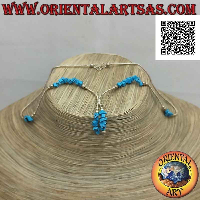 Choker necklace of 925 ‰ silver beads and turquoise fragments strung with a tuft
