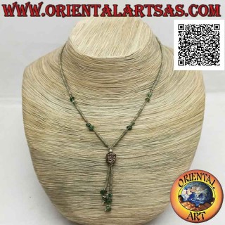 Choker necklace of tubes and fragments of raw green jade and 925 ‰ silver strung with a tuft
