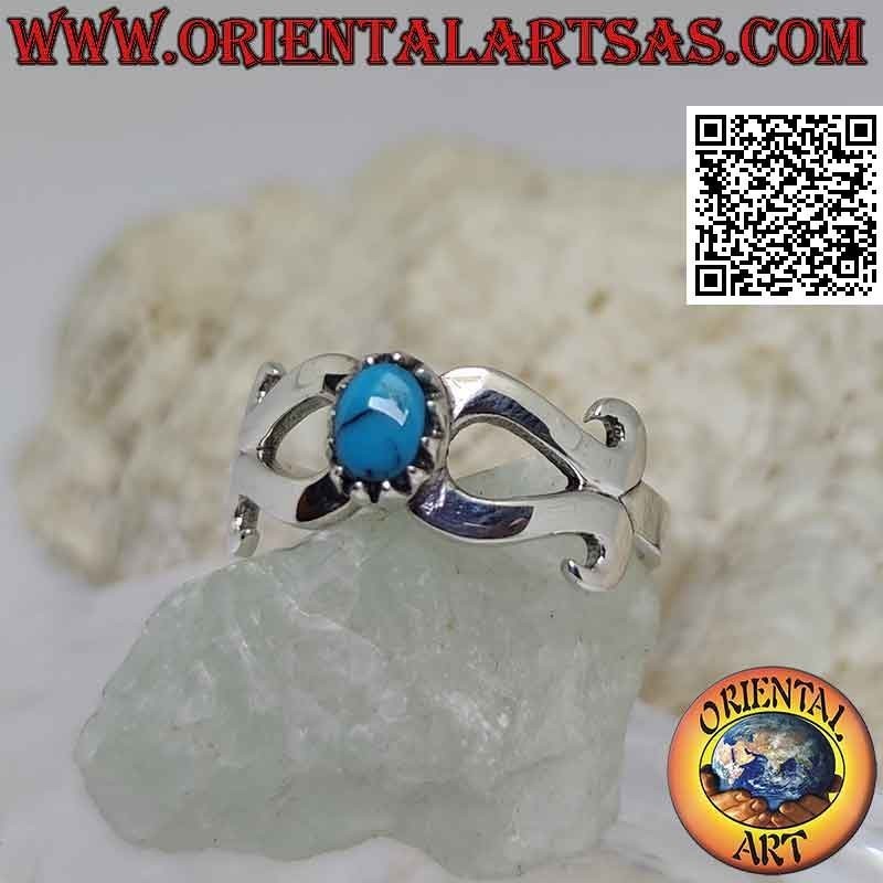 Anillo de plata con turquesa en el centro de un infinito suave