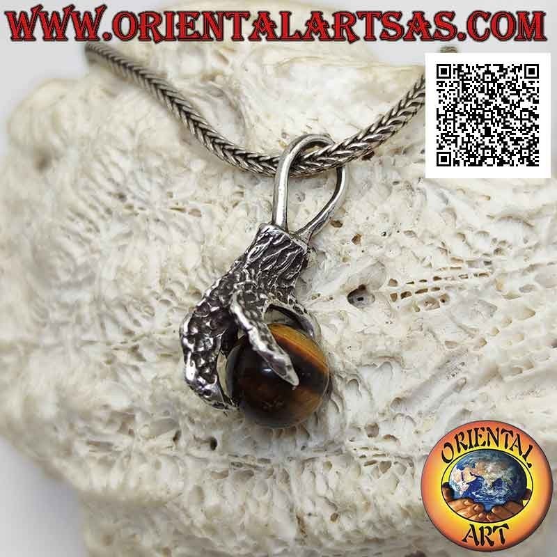 Silver pendant, tiger eye ball gripped by a four-clawed paw