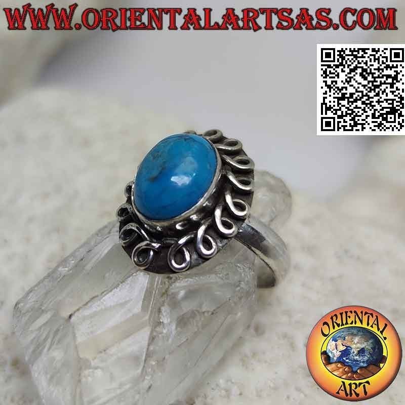 Silver ring with cabochon oval turquoise surrounded by a rolled line