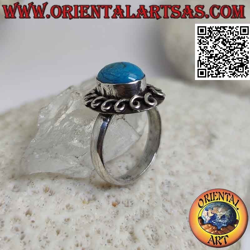 Bague en argent avec cabochon ovale turquoise entouré d'un trait roulé
