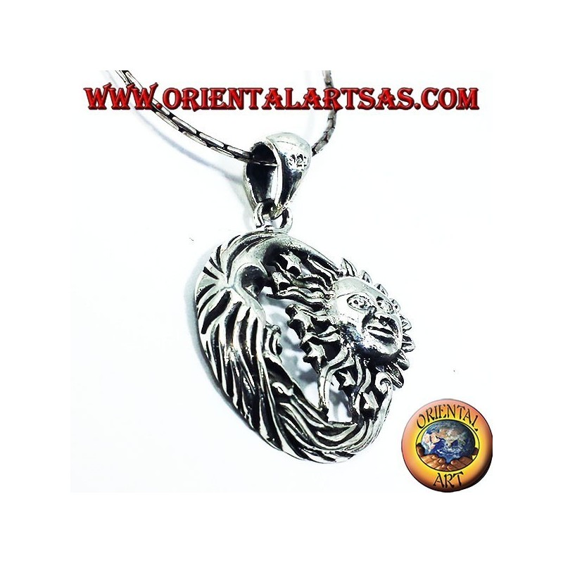 silver pendant, sun and moon